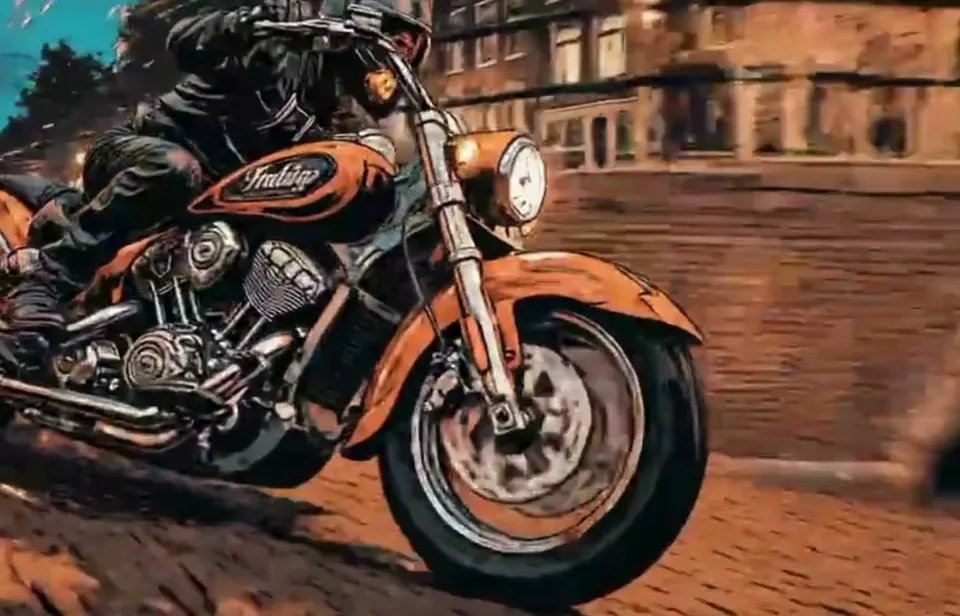 A close view of the machine on a canal street at night, the rider low over the bars, the Indian script badge legible on the orange fuel tank and the front wheel and brake disc in full view.